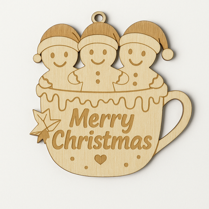 Wooden Christmas ornament with three gingerbread men in a mug and 'Merry Christmas' text.
