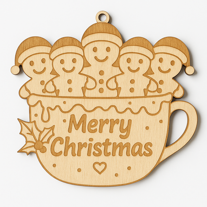 Wooden Christmas ornament with gingerbread men in a mug and 'Merry Christmas' text.