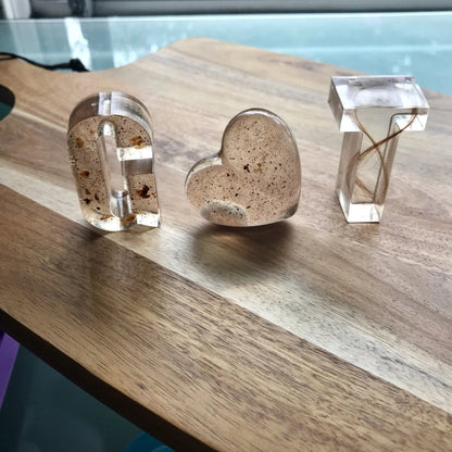 Letters made with hair, umbilical stump, dried placenta keepsake