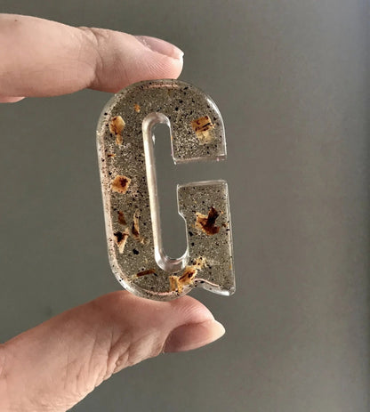 Letter 'G' made with umbilical cord and resin keepsake